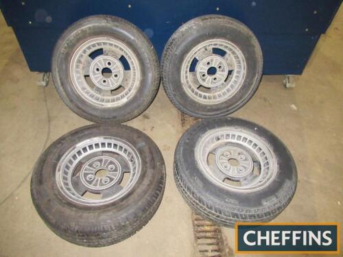 Set of 4 Jensen wheels and tyres, damage to one tyre
