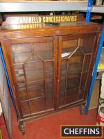 Maranello Concessionaires, an oak display cabinet t/w framed and glazed images of Colonel Ronnie Hoare, ex-Colonel Ronnie Hoare set, Goodwood Revival