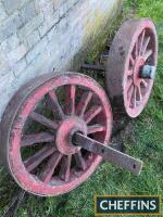 Richard Garrett pair of heavy duty steam wagon type wooden wheels with axles and steel bands, 35ins dia'