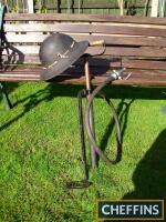 Stirrup pump and tin hat