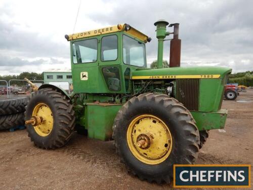 JOHN DEERE 7520 4wd diesel ARTICULATED TRACTORSitting on dual wheels with new tyres all round and swinging drawbar. Showing 8,618 hours