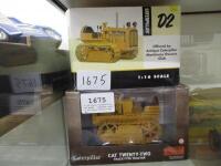 1:16 scale Caterpillar D2 model, together with 1:16 scale Caterpillar 22