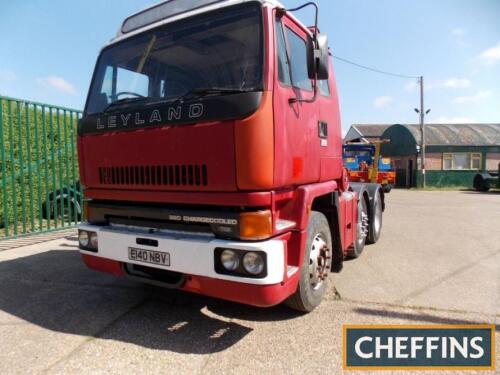 1988 Leyland Roadtrain 20-32 32tonne 6x2 tractor unit Reg. No. E140 NBV Chassis No. SBSM5A34RSCJ72698 Fitted with a Cummins 320 14ltr 6cylinder diesel engine and equipped with a sleeper cab and Eminox stainless steel exhaust stack. Offered with a plating