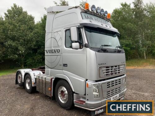 2004 Volvo FH16 610 Globetrotter XL 6x2 tag axle Tractor unit. Reg no F16 HHH Chassis no A580862. Finished in silver with a maroon chassis the Volvo with walnut trim and leather seats to the twin sleeper cab shows 912,830 kms. Fitted with alloy wheels, tw