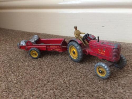 Die-cast Massey-Harris tractor model, together with Massey Harris muck spreader