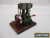 Stuart twin-cylinder, vertical steam engine 3 1/8ins flywheel, base 5x7ins rotating freely