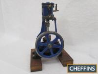 Stuart Turner No.1 single cylinder vertical model steam engine, mounted to wooden base. A popular model that has a free turning motion (flywheel diameter 7ins, base 11x9ins)