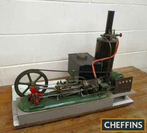 Antique model steam engine, horizontal single cylinder with plank lagged cylinder and boiler, twin ball governor. The single flywheel engine driving a dynamo, connected to a lighting board. 29x16x23ins tall