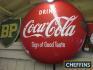 Drink Coca-Cola, an enamel sign in the form of a bottle cap, 25ins in diameter