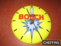 Bosch, a circular plastic illustrated battery operated clock, 12ins in diameter