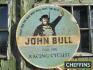 John Bull For The Racing Cyclist, a hard board tyre insert sign, 24ins in diameter