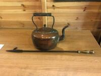 Copper kettle and brass handle poker