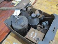 Collection of oil-cans, jugs etc. together with small shovel