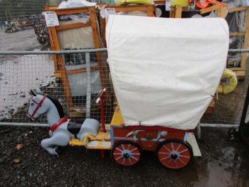 Vintage fairground stagecoach ride