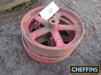 2no. cast iron wheels 11.5ins in diameter, 2.5ins wide, 3/4ins centre
