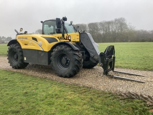 2019 NEW HOLLAND TELHANDLER TH7.42 NOT AT ULTING CALL TO ARRANGE VIEWING IF REQUIRED,784 HOURS AT START OF AUCTION, FINANCE AVAILABLE TH7.42 ELITE 145HP,HYD MANITOU CARRIAGE & FORKS, REVERSE COOLING FAN, HYD PICK-UP HITCH, SMOOTH RIDE CONTROL, 500/70-R24