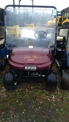 2016 EZGO TXT-E BURGUNDY 48 VOLT, ON BOARD CHARGER, FOLD DOWN WINDSCREEN, SUN CANOPY, BATTERY FILLING KIT, TWIN BAG CARRIER, SWEATER BASKET. 3197066 11176970