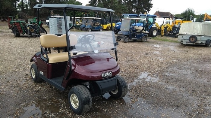 2017 EZGO TXT-L LITHIUM BERGUNDY 48 VOLT DC LITHIUM ION, ON BOARD CHARGER, FOLD DOWN WINDSHIELD, BLACK SUNTOP, TAN SEATS, TWIN BAG CARRIER, SWEATER BASKET. 3301651 11178374
