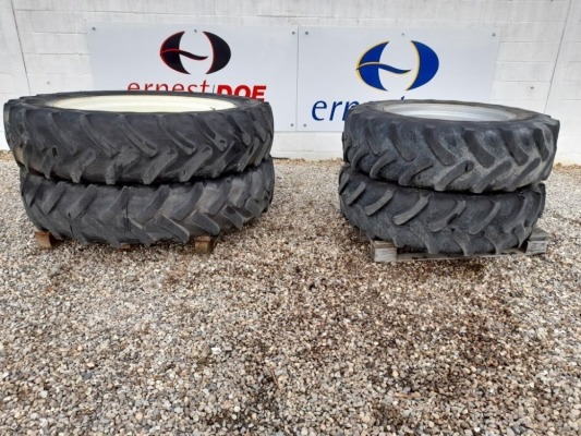 1 X SET OF INFINITY LR861 380/85 R30 TYRES ON 8 X STUD SILVER RIMS & CONTINENTAL CONTRACT AC85 380/85 R46 TYRES ON 8 X STUD WHITE RIMS, WHEELS & TYRES, PAINT OFF RIMS IN PLACES, SOME SURFACE RUST (C1168254 1)
