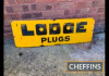 Vintage Lodge Plugs, an enamel sign