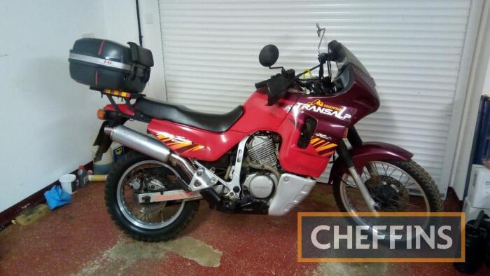 1996 583cc Honda Transalp MOTORCYCLE Reg. No. N714 FEX Frame No. JH2PD06A1TM001827 Engine No. PD06E2803144 A sought-after model that is increasingly difficult to find; the V-twin is stated to be in good condition and is fitted with an aftermarket Remus si