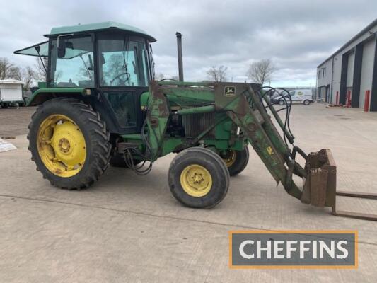 1986 JOHN DEERE 2140 diesel TRACTOR Reg. No. C261 JVL Serial No. 550394 Fitted with John Deere front loader, pallet forks, muck fork, bucket, 2no. spools, SG2 cab and mechanical drive on 13.6-39 rear and 7.00-16 front wheels and tyres