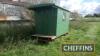 Shepherd's hut of modern construction on cast wheels