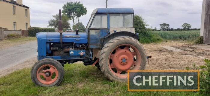 1957 FORDSON Super Major 4cylinder diesel TRACTOR Reg. No. 310 UYJ Serial No. S725237 A blue/orange example fitted with a cab