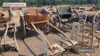 Horse-drawn governess cart in varnished wood finish, complete with lamp holders