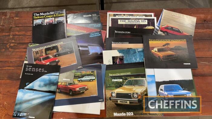 Qty Japanese car manufacturer sales brochures etc, to include Mazda 323 range brochure