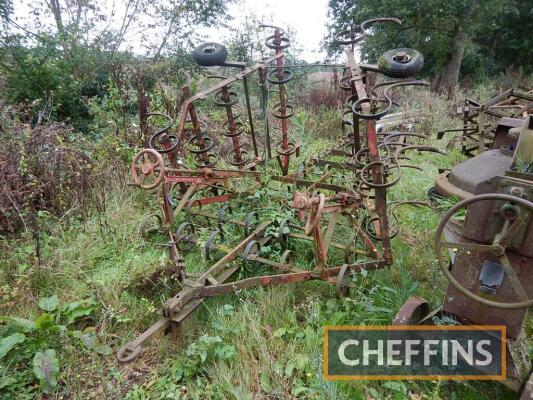 Trailed folding springtine cultivator