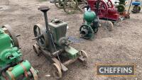 The Bomford 3bhp horizontal open crank stationary engine No. 21620 twin flywheel, Wico magneto, original condition, trolley mounted 
<br/>starting handles in office