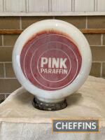 Pink Paraffin, a fuel pump glass globe