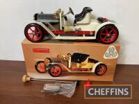 Mamod steam car, boxed and unused, complete with burner, funnel and steering rod