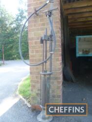 Hand-cranked skeleton petrol pump with Redline plaque to base, in original unrestored condition