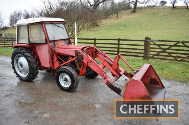 1975 MASSEY FERGUSON 148 Multi-Power diesel TRACTOR Fitted with Multi-Power, power steering, MF40 loader, Flexi cab, selector valve, MF spool valve, rod linkage, pick-up hitch, fork and bucket with loader and heavy-duty grille guard on Stomil 12.4-32 rear