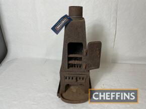 Living wagon cast iron stove of pyramid form, 25ins tall