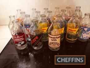 Crate of advertising milk bottles, 20 bottles, all different