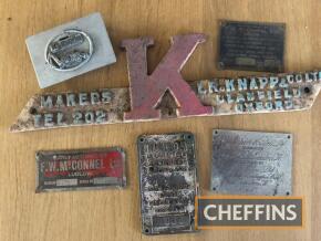 Collection of manufacturers' name plates; Tullos, McCormick, Knapp etc.