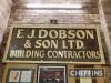 E J Dobson & Son, a large painted wood sign 37x84ins