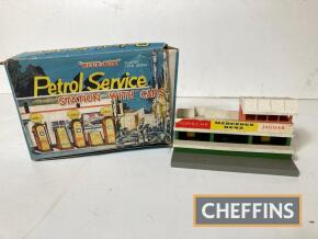 Petrol service station (boxed), together with model garage, two plastic toys