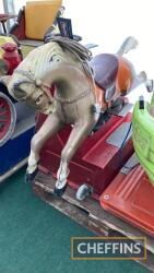 Coin-operated horse ride