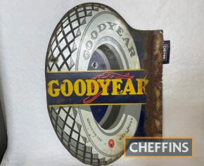 Goodyear, a double-sided enamel sign in the form of a tyre, 34 x 24ins