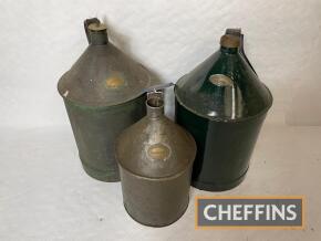 Three conical oil cans with retailers' plates