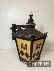 AA, a wall-mounting lantern with cast aluminium bracket, 25ins tall