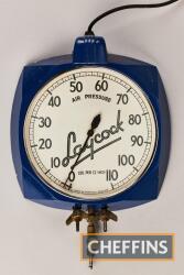 Laycock wall-mounted tyre pressure gauge in fine original condition, cast body 11ins wide, complete with air line and period tyre inflator