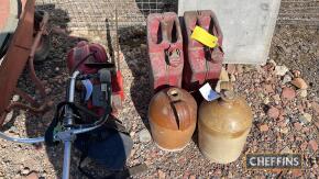 Two stone storage jars, together with 2 Jerry cans