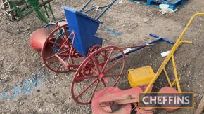 Large iron wheel cup feed seed drill