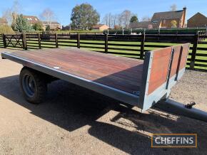 Ferguson 12stud trailer modified to be non-tipping with built-in pull-out ramps and hardwood flooring