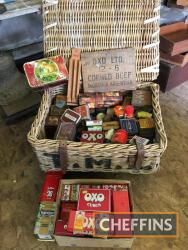 Wicker basket with various vintage tins